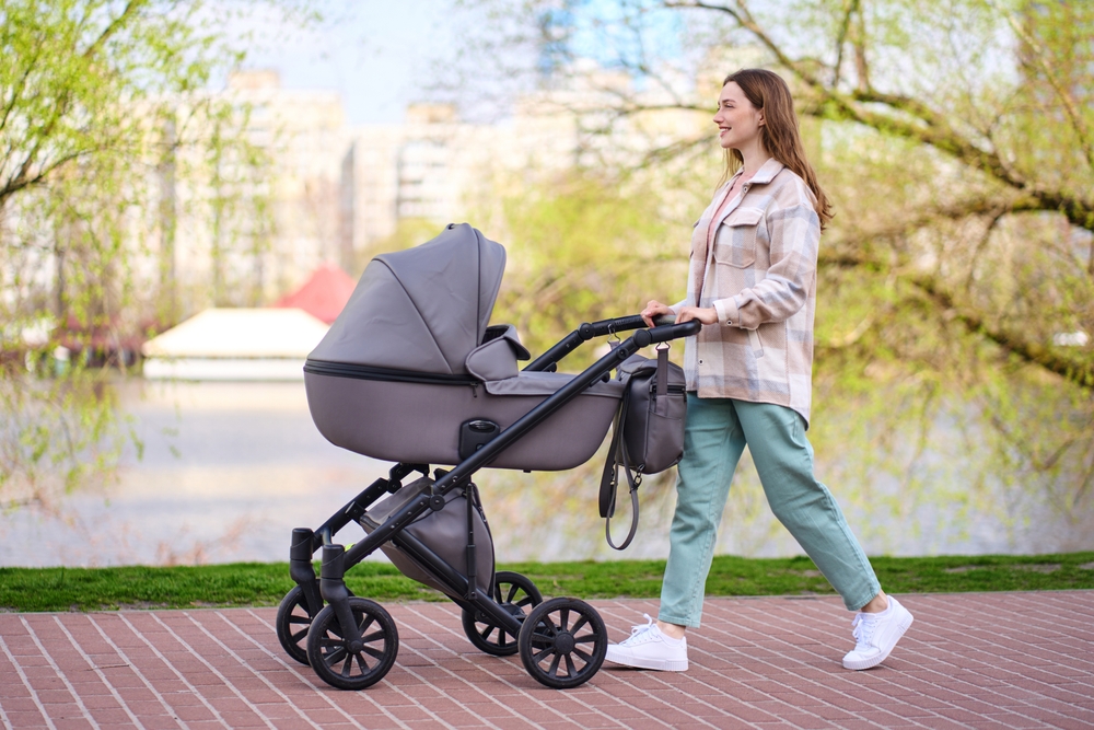 Woman pushing child in stroller